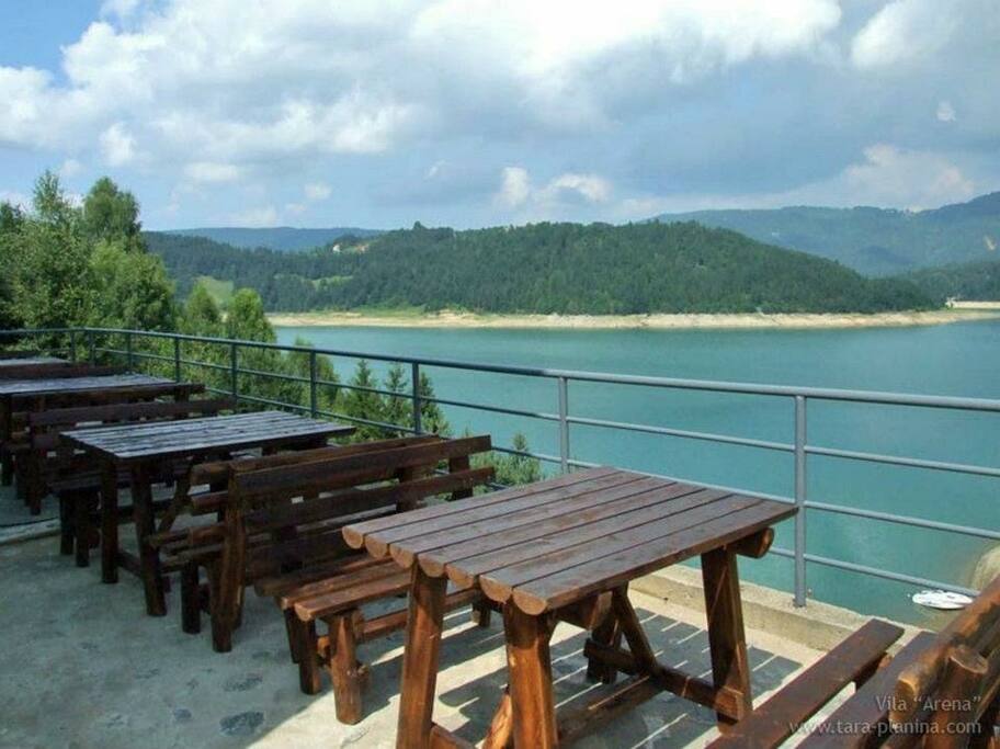 Enjoy the most beautiful sunrise on our terrace while making grill and sipping our traditional drink rakija.
