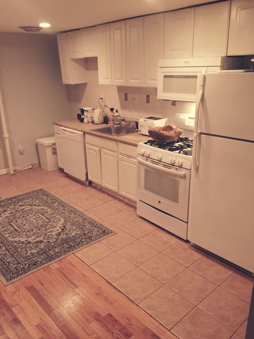 Common area includes a kitchen with full use of flatware, plates, pots/pans, coffee maker and juicer to make healthy, homemade meals when you prefer to stay in