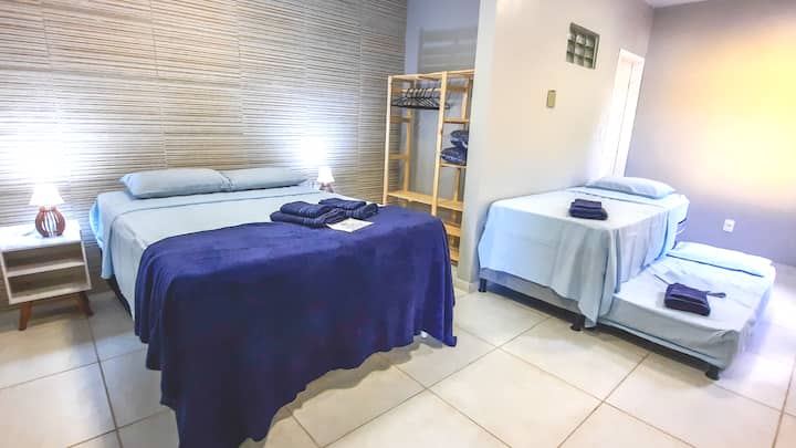 Suite 4 -  1 full bed, 1 single bed, 1 single bed, bathroom and air conditioning.