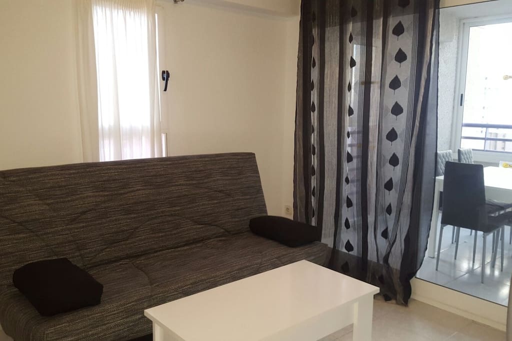 Salón con sofá cama