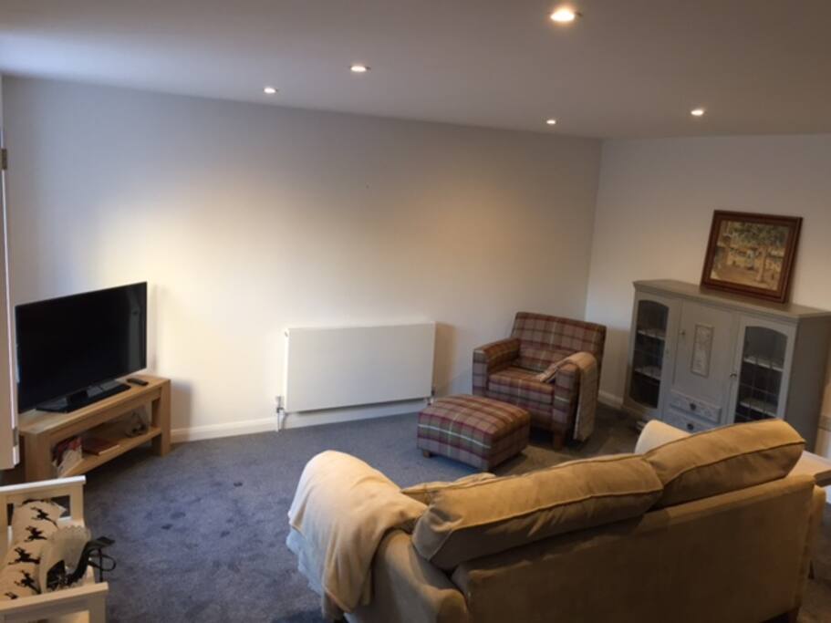 Cosy lounge with TV.