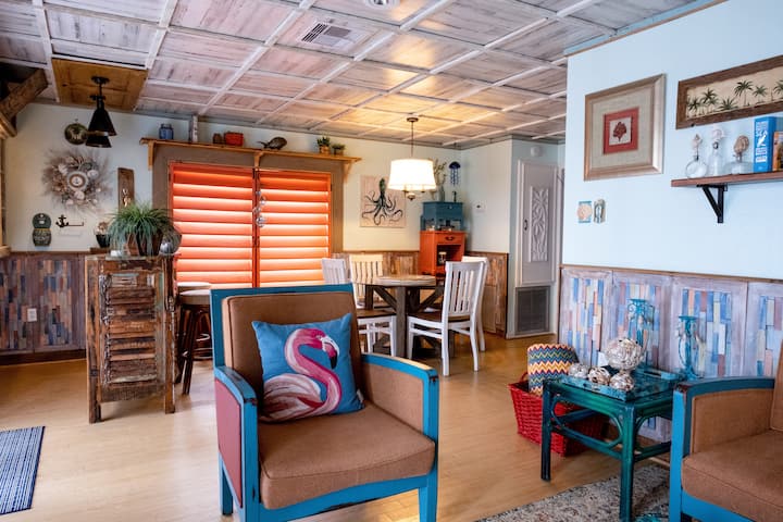 Livingroom looking into dining area leading to kitchen to the right