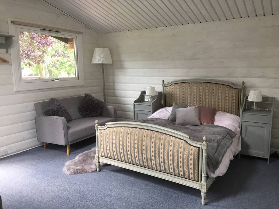 Norwegian chalet tucked away at the end of the garden which has its own TV and fridge.