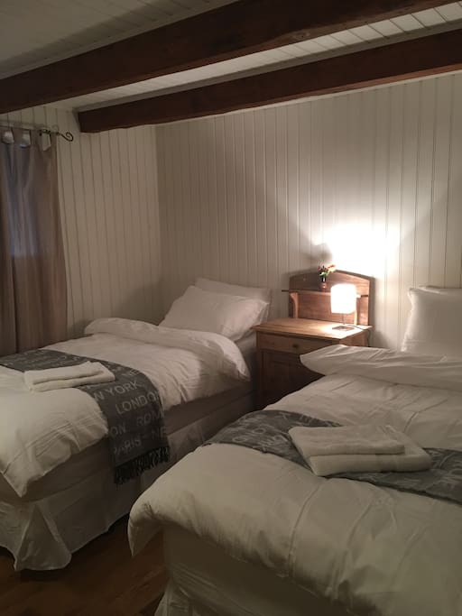 White linen and blankets for cold nights.