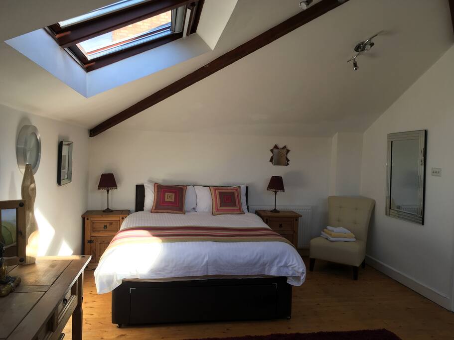 King size bed in a very spacious room