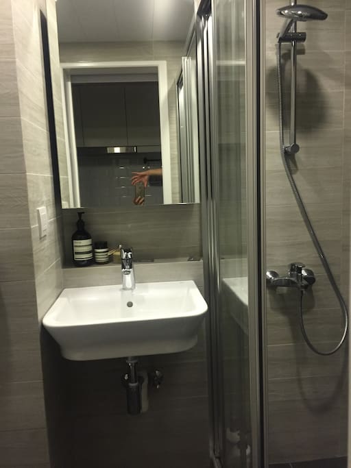 Modern, clean and spacious bathroom, with full sized shower.