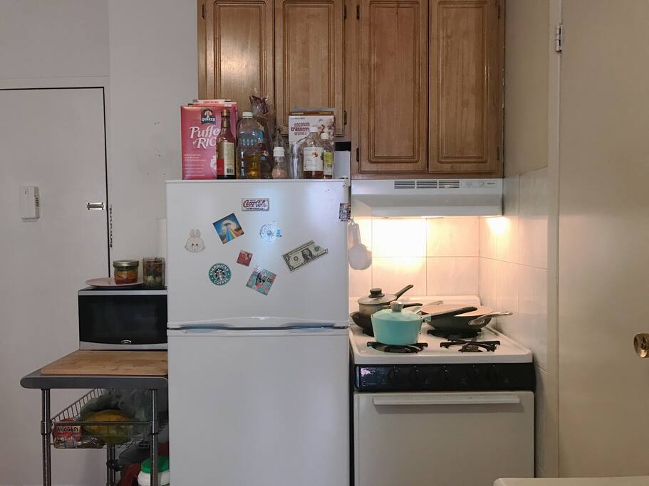 Mini yet fully functional kitchen with a HUGE spice and sauce collection!