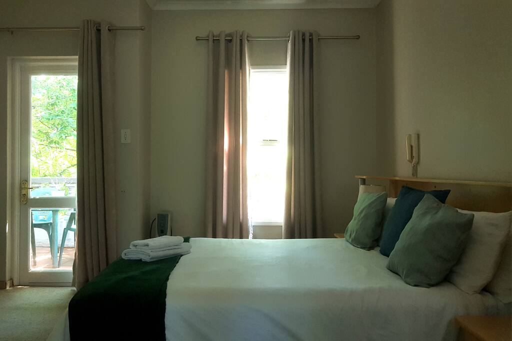 Main bedroom leads onto balcony