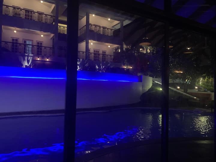 POOL VIEW AND VILLA FROM ENTERTAINMENT ROOM