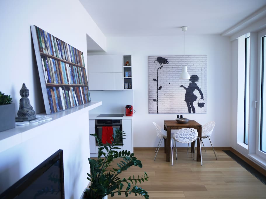 Living room area is brightened with art pieces