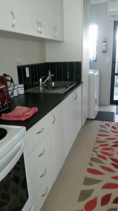 Full kitchen including oven