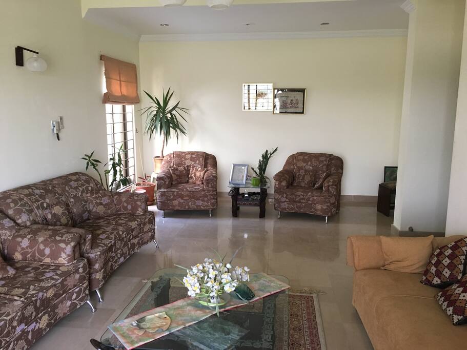 Formal living room can sit up to 10 people