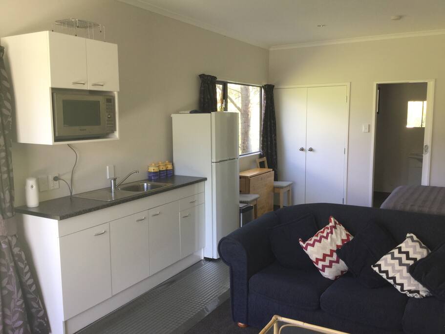 Small Kitchenette - but perfectly functional - with a kettle, toaster and all the cutlery.