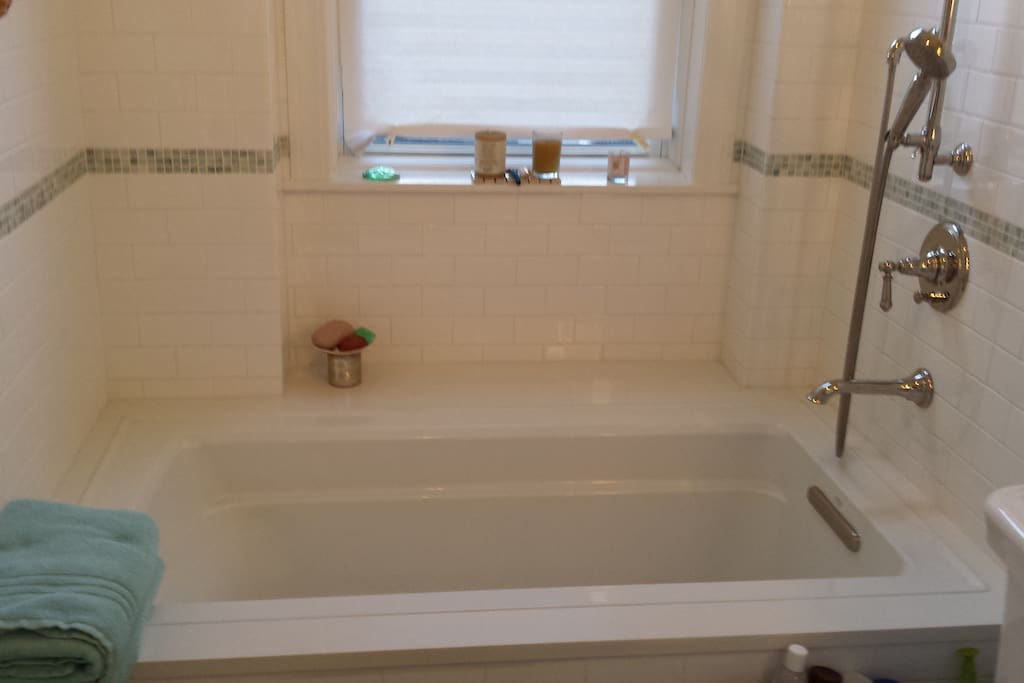 Soaking tub..beautifully appointed bathroom
