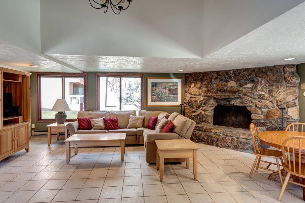 Inside of Club House for extra room/entertaining/relaxing. Includes TV, Fireplace and eating area