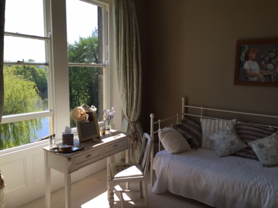 Crompton Suite. Spare single bed and river view