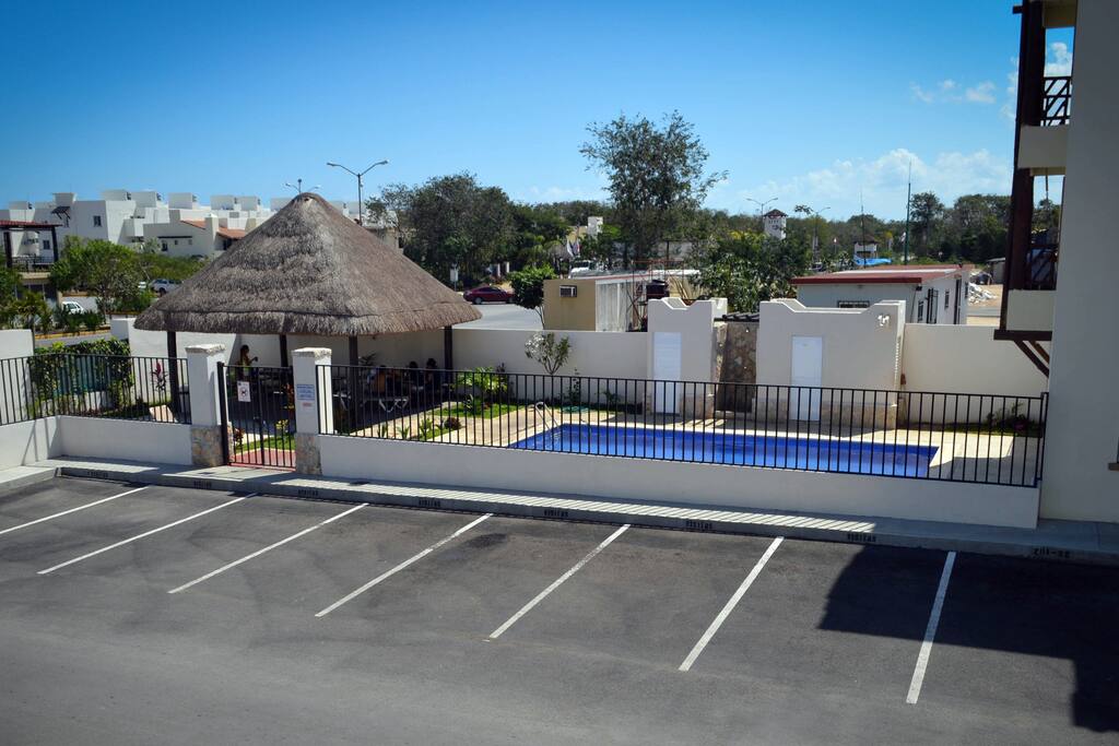 Zona de Alberca y Palapa