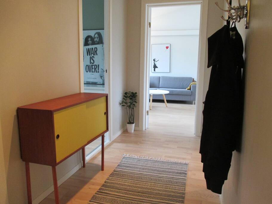 Welcome. Entrance with sliding door wardrobe