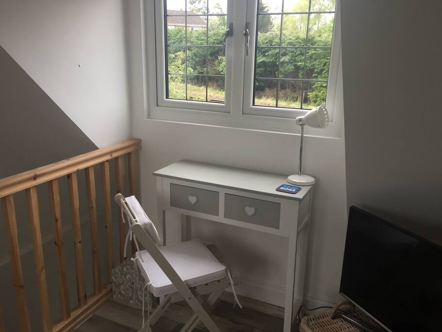 Small console desk suitable for laptop.