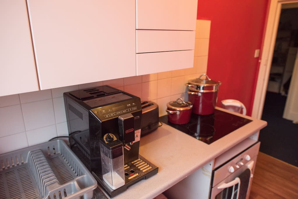 Coffee machine makes espresso, cappuccino and hot water for tea and hot chocolate