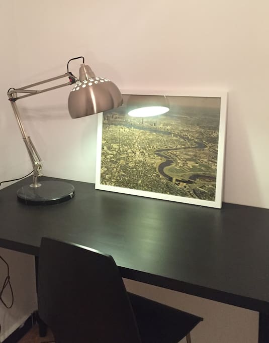 Desk for reading and working. The photo was Boston, a city we both love.