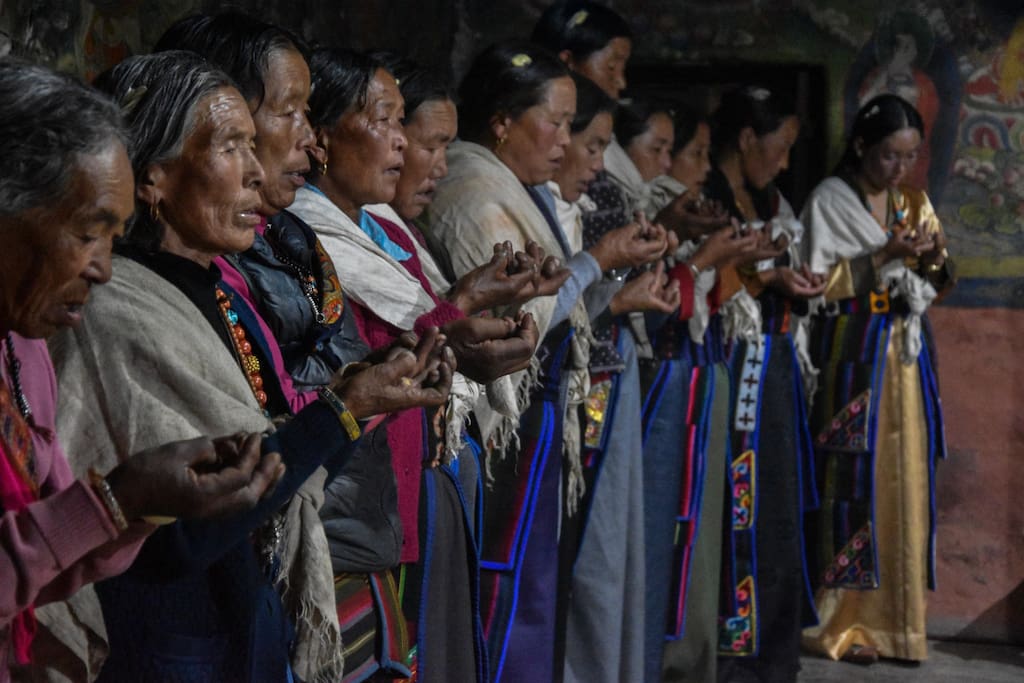 Traditional prayer offer by local women in an auspicious occasion