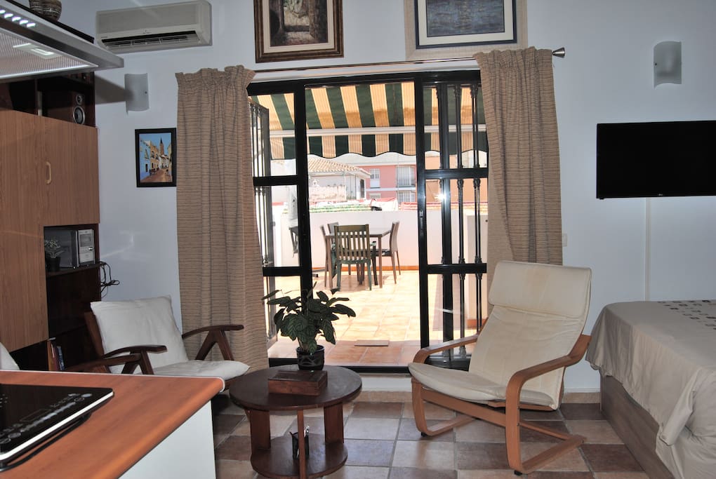 Zona de estar y acceso a la terraza