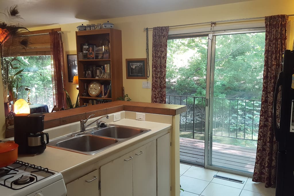 Kitchen, gas range, coffee maker.