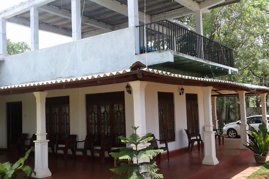 the front of the house has ample outdoor seating areas