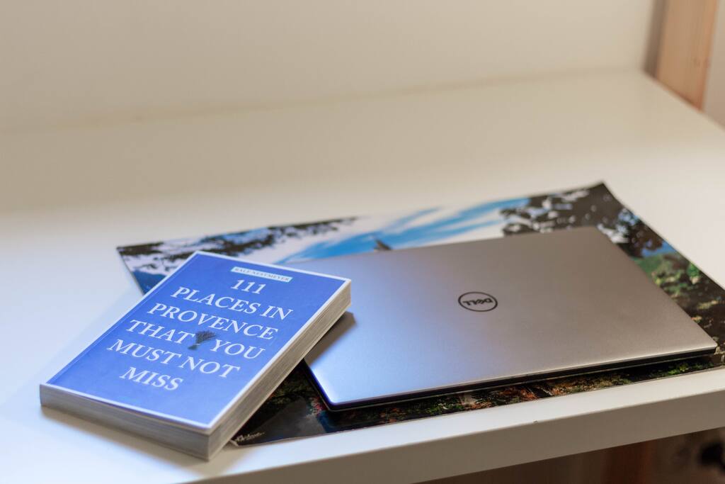 Private desk with power & Wifi, perfect for planning your trip around!