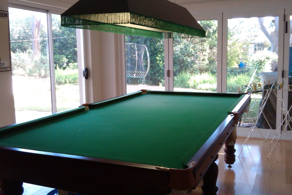Big rumpus room (with adjoining toilet) opening onto large garden through bifolds. Separate access to this area via a gate. Esky plus tea and coffee facilities here, also electric frypan if needed, utensils, disposable plates, gas heater for cold weather, use of dartboard and pool table, plus use of indoor table and chairs if desired.