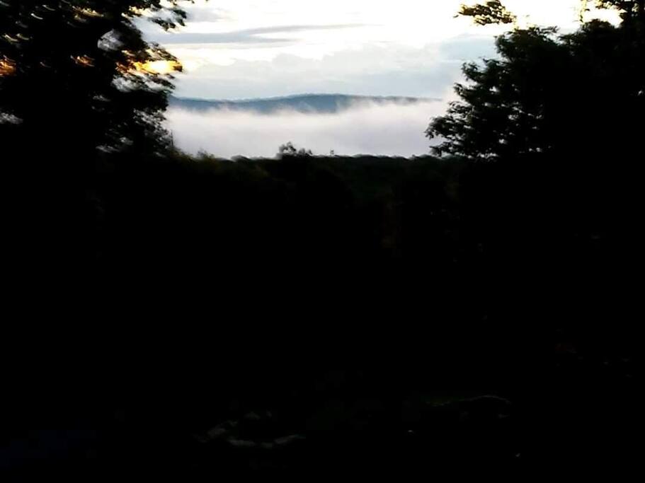 Fog hanging in the valley below