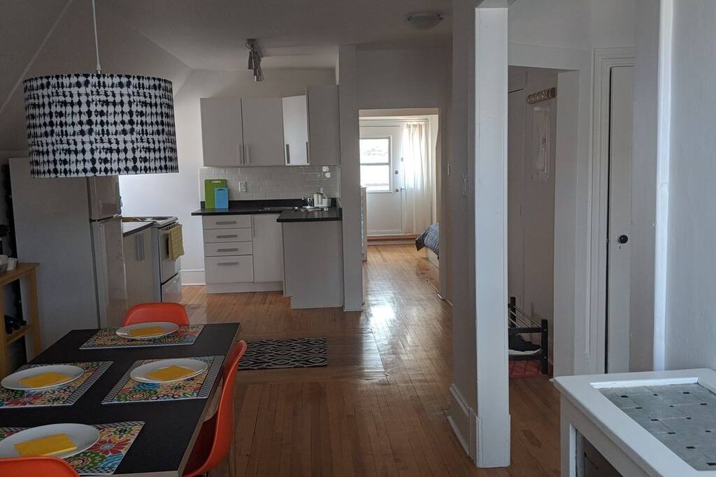 The long-shot. Open-concept dining room and kitchen makes for easy ferrying of meals and snacks!