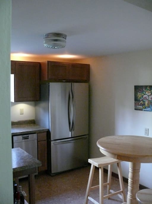 Kitchen w/ Pub Table and Stools