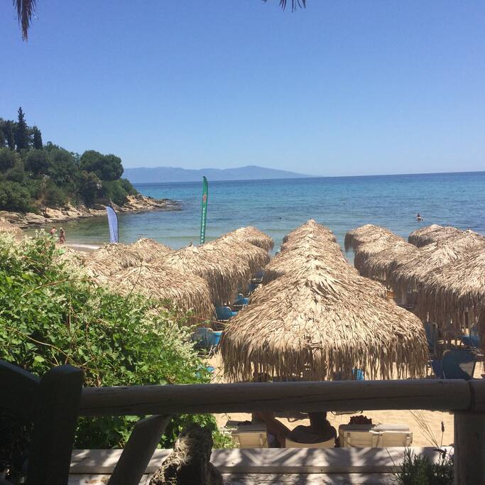 And this is the beach next door (3-4 min walk by the sea) the service is great, the food yummy and despite its preparedness - its rarely even half full