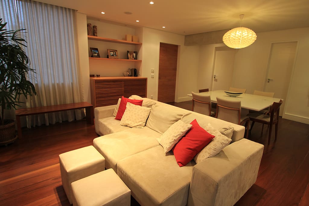 Large 35m² living room with air conditioning system, cross ventilation, home theater, dining table for 8 people, lavatory and a small balcony