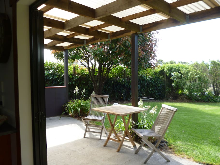 Pleasant outdoor covered patio garden space to watch the sunsets.
