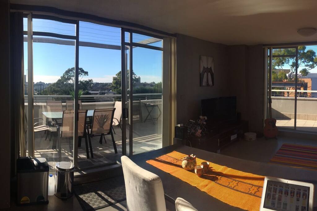 Large open plan with two entries to big terrace