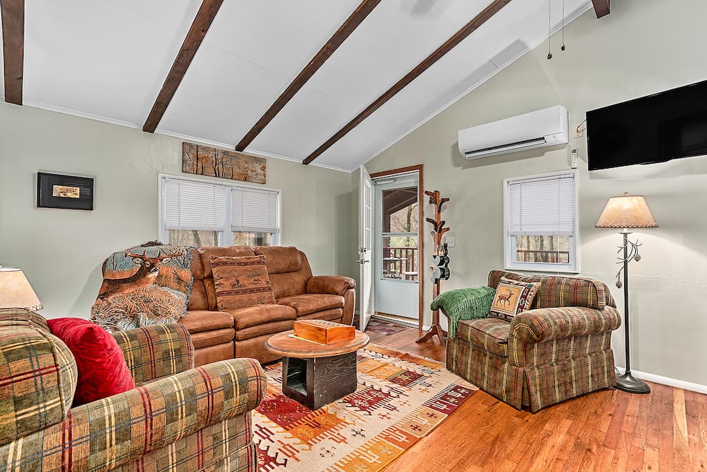 Cozy living room with comfortable furniture and ROKU TV
