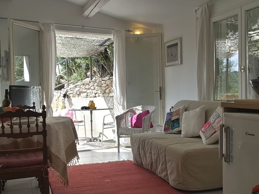 The Sitting Room showing French doors onto one of the 3 private terraces of the apartment