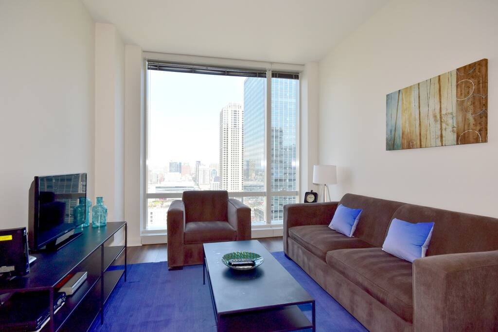 Living Area with Queen Pull-Out Sofa. Cable, Internet and Telephone Included.