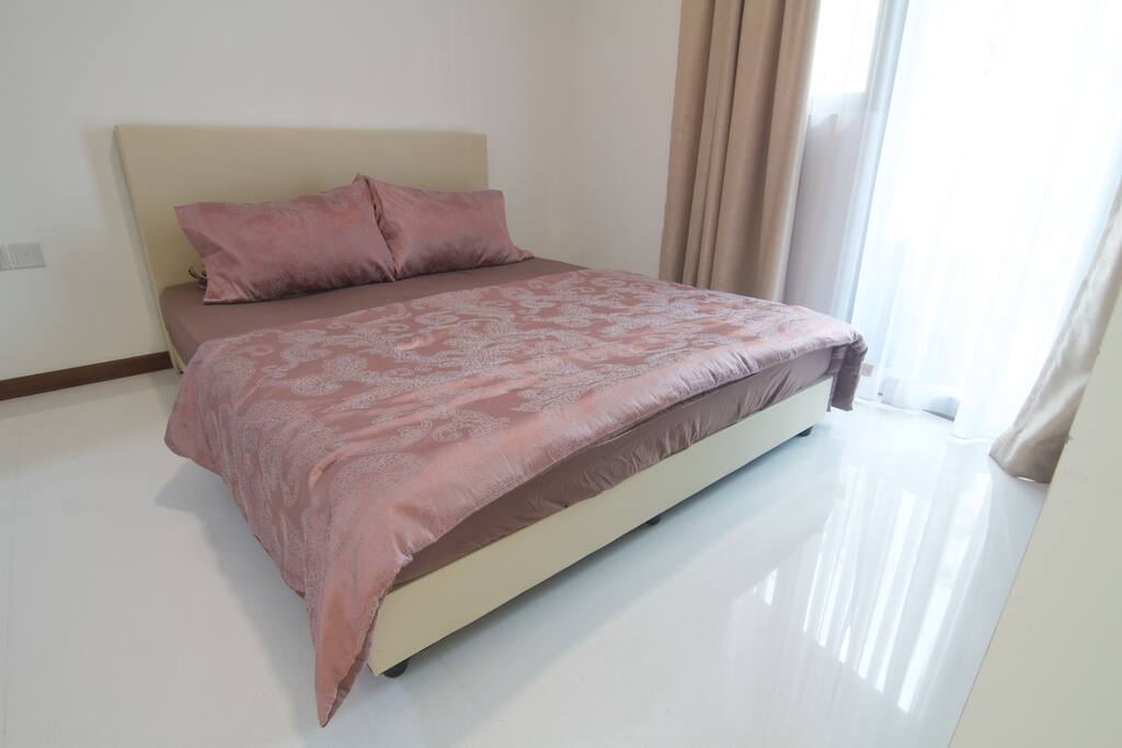 Queen-sized bed suitable for 2 people