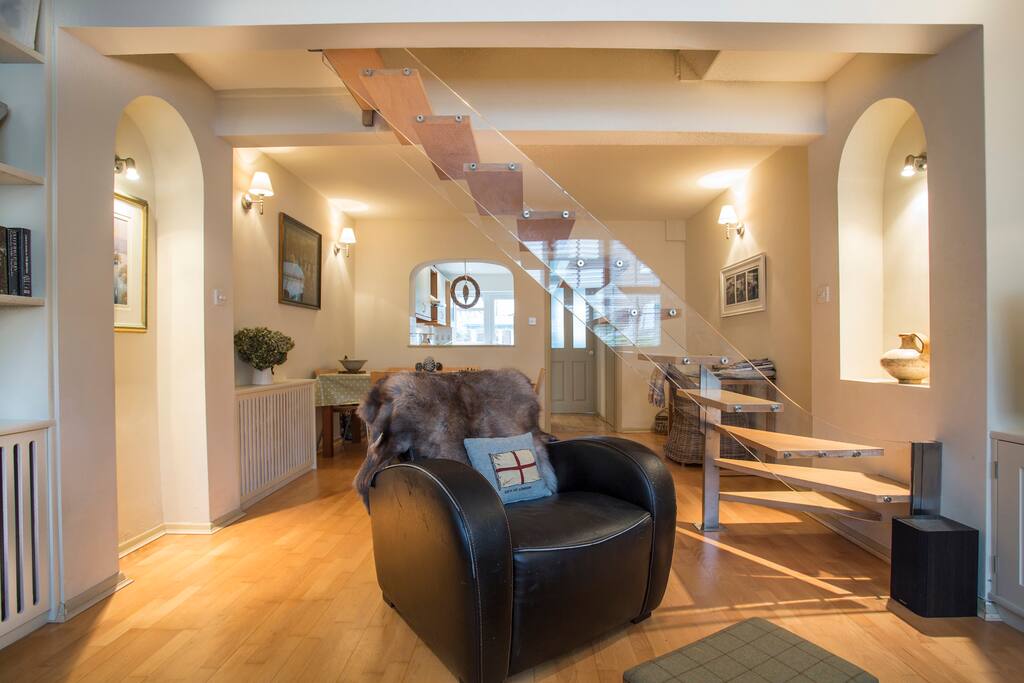 Leather chair positioned for TV viewing.