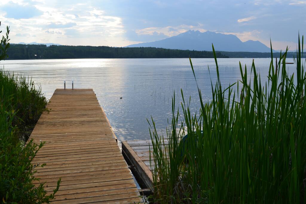 Docks with canoe and swimming dock in the distance
