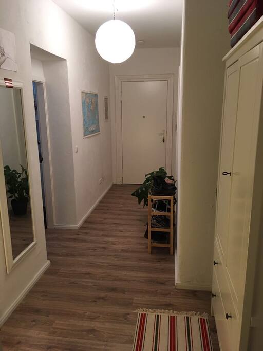 large hallway where you can store shoes, jackets and other stuff