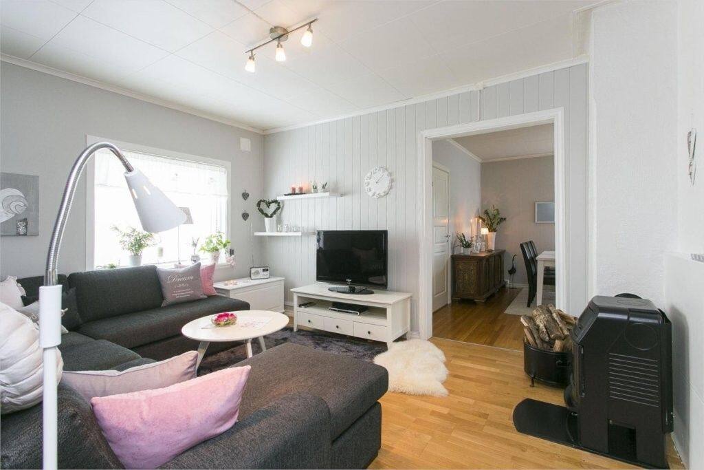 Living room with a fireplace. Relaxing atmosphere