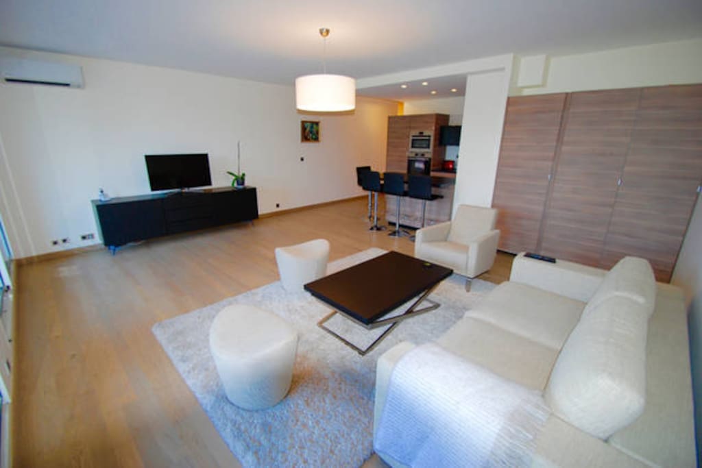 Lounge area with flat screen tv, bose sound-link-mini system, luxury fittings and furnishings.