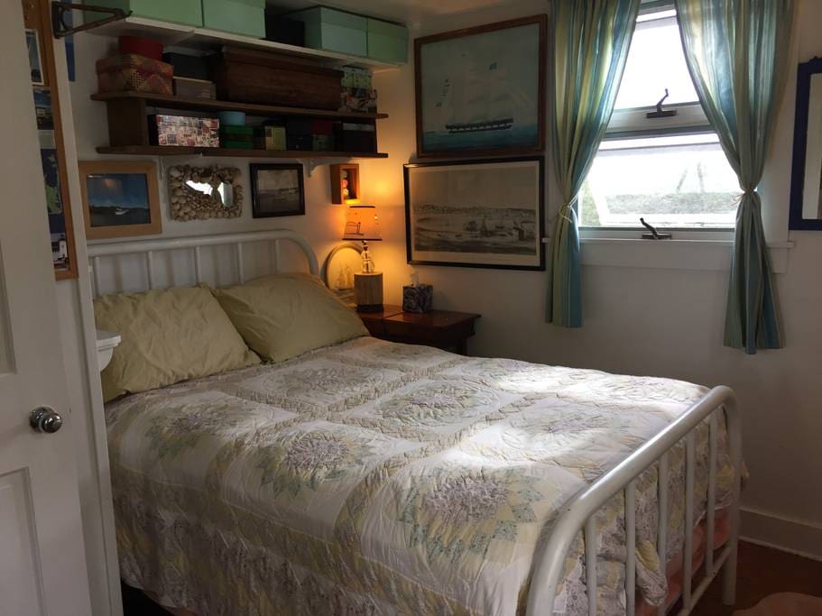 Full size bed in farm house.