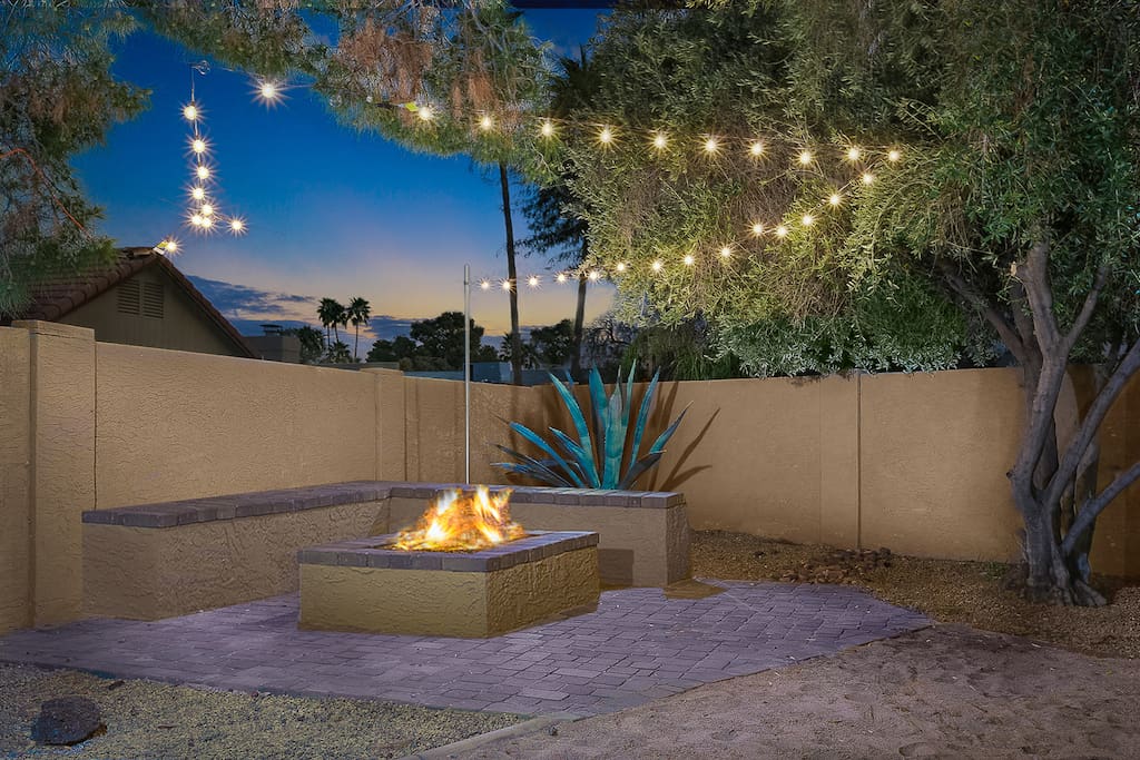 Outdoor fire pit with string lights!