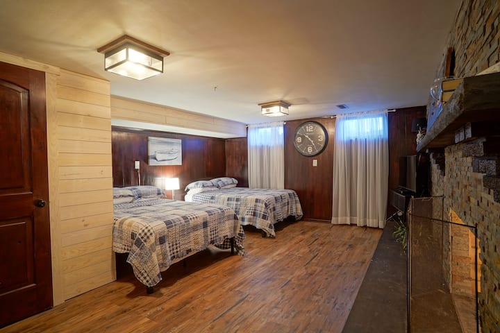 The Stow-a-way Room. Sleeps 4. Features two full-size beds, gas fireplace, oscillating fan, smart tv with cable. 